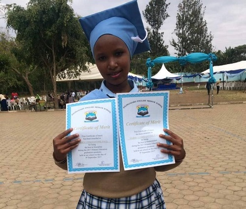 Top performer Mary gets school scholarship